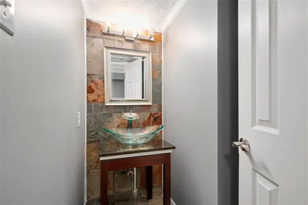 a view of a kitchen from the closet