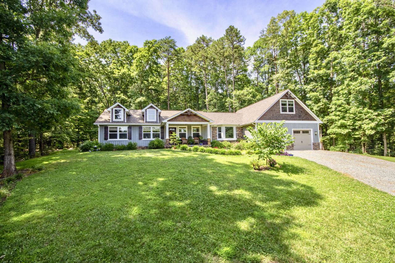 13220 West Gretna Road Sandy Level, VA 24161 - Photo 14 of 48 a front view of a house with garden