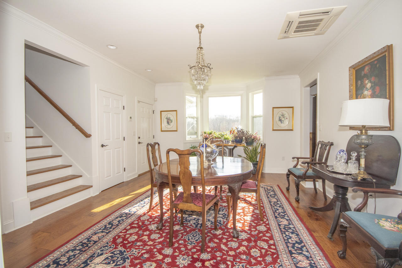 13220 West Gretna Road Sandy Level, VA 24161 - Photo 37 of 48 a view of a a dining room with furniture window and wooden floor