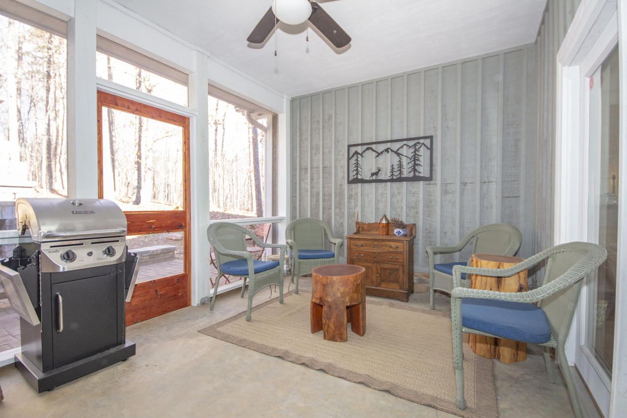 13220 West Gretna Road Sandy Level, VA 24161 - Photo 38 of 48 a living room with furniture and a window