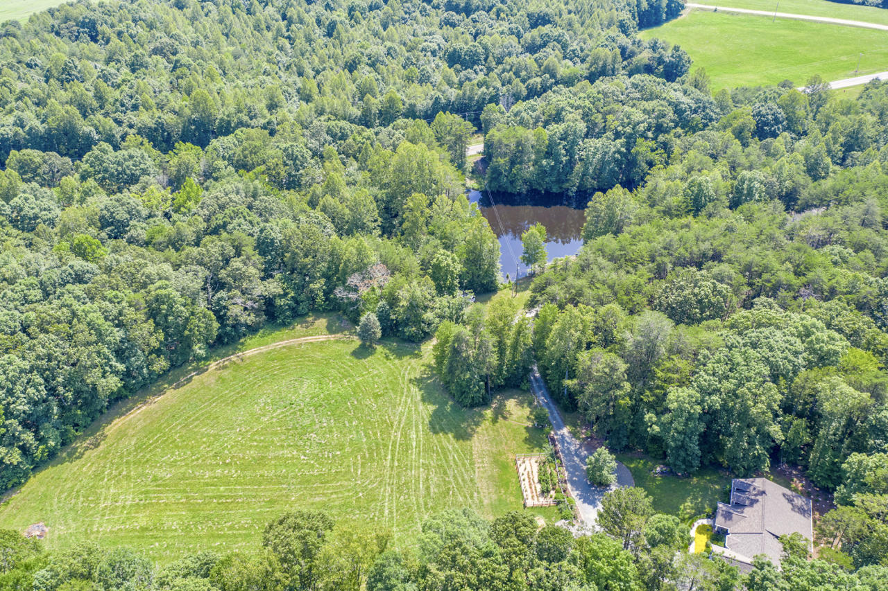 13220 West Gretna Road Sandy Level, VA 24161 - Photo 5 of 48 a view of a garden with a house