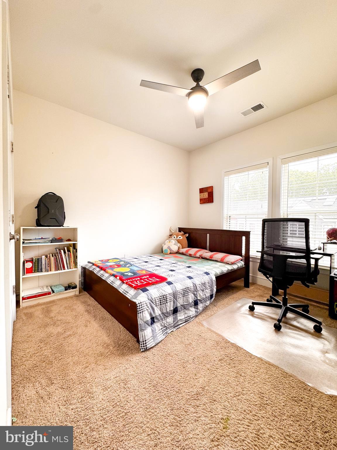 25419 Reed Orchard Terrace Chantilly, VA 20152 - Photo 34 of 47 a bedroom with a bed and gym equipment