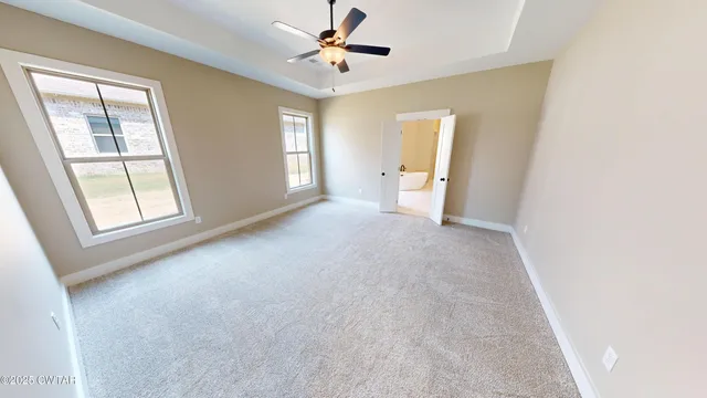 a bathroom with a sink toilet and a mirror