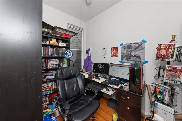 a view of a workspace with furniture