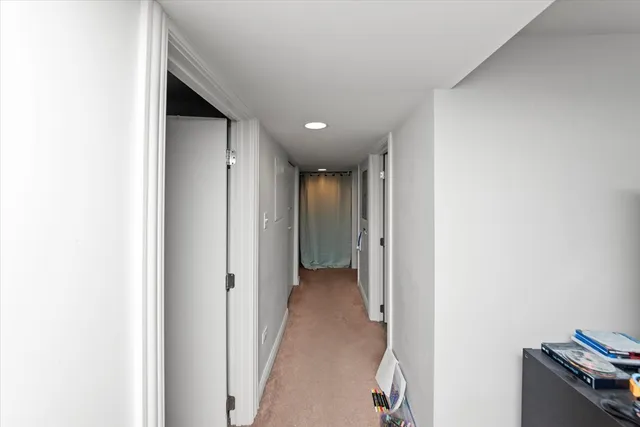 a view of hallway with livingroom
