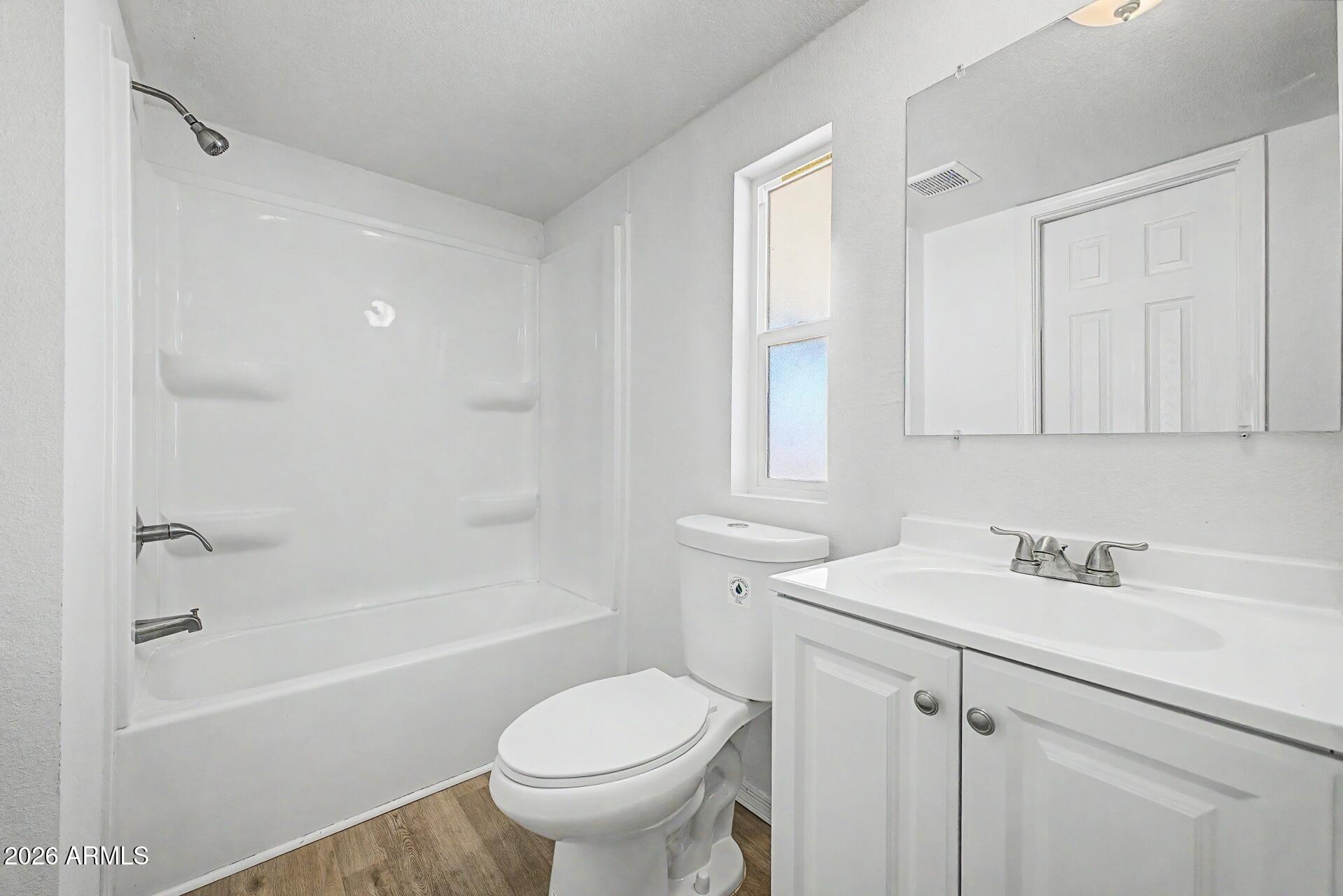 320 East McKellips Road, Unit 58 Mesa, AZ 85201 - Photo 20 of 22 a bathroom with a sink toilet and bathtub