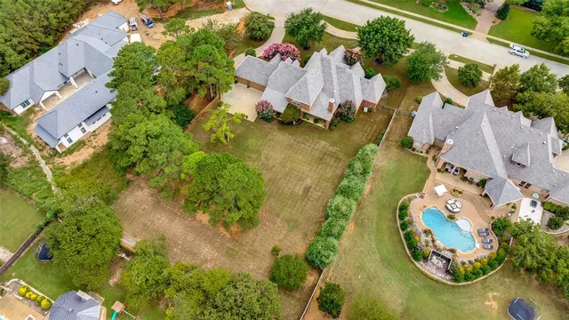 an aerial view of a house with outdoor space