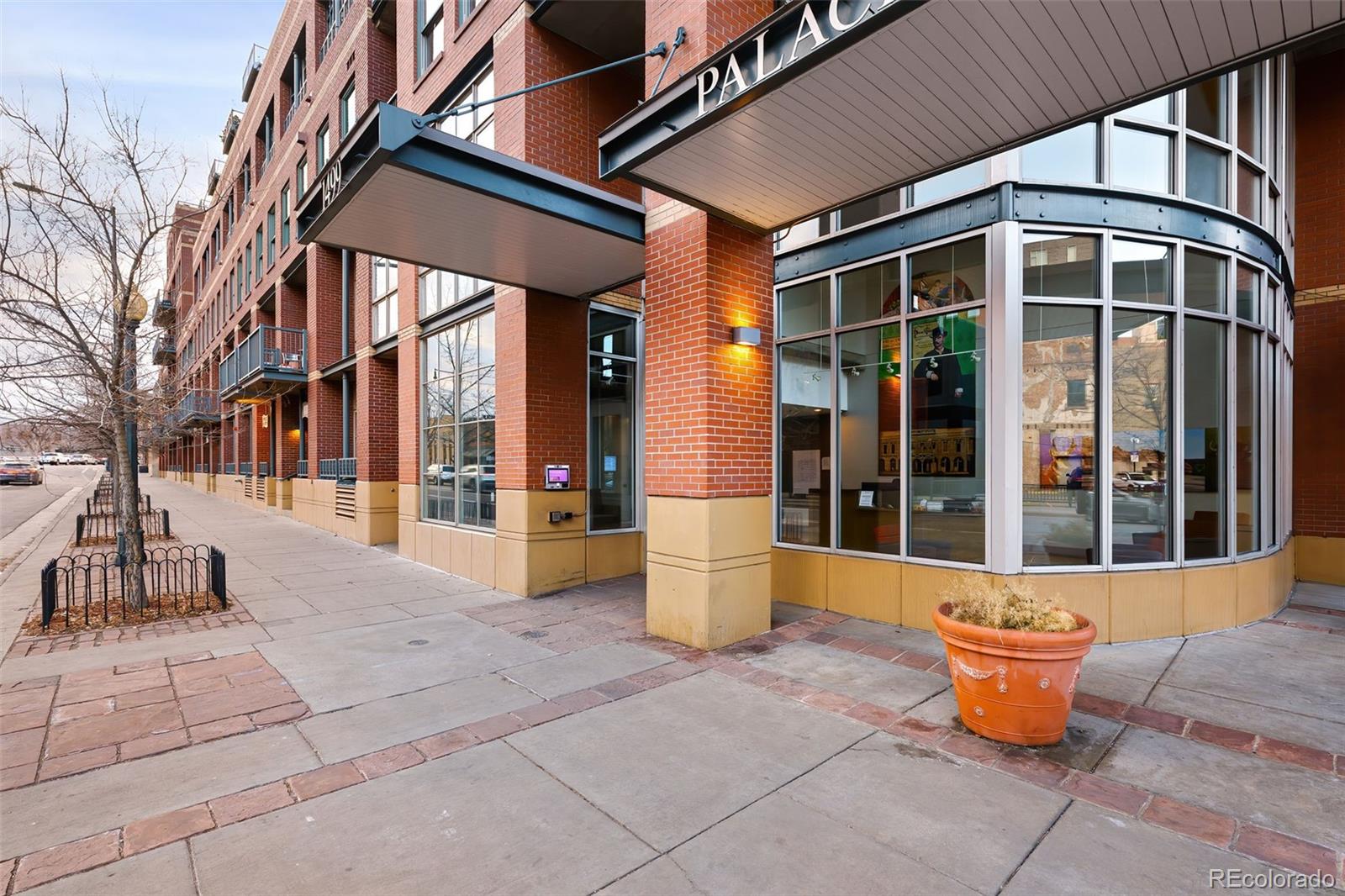 1499 Blake Street, Unit 6A Denver, CO 80202 - Photo 39 of 46 a front view of a building with outdoor seating