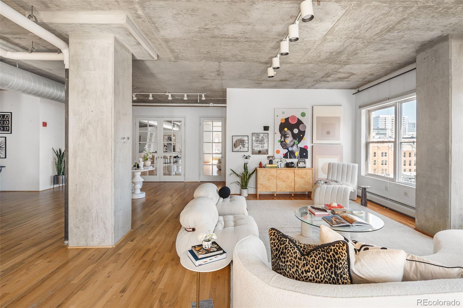 1499 Blake Street, Unit 6A Denver, CO 80202 - Photo 9 of 46 a living room with furniture