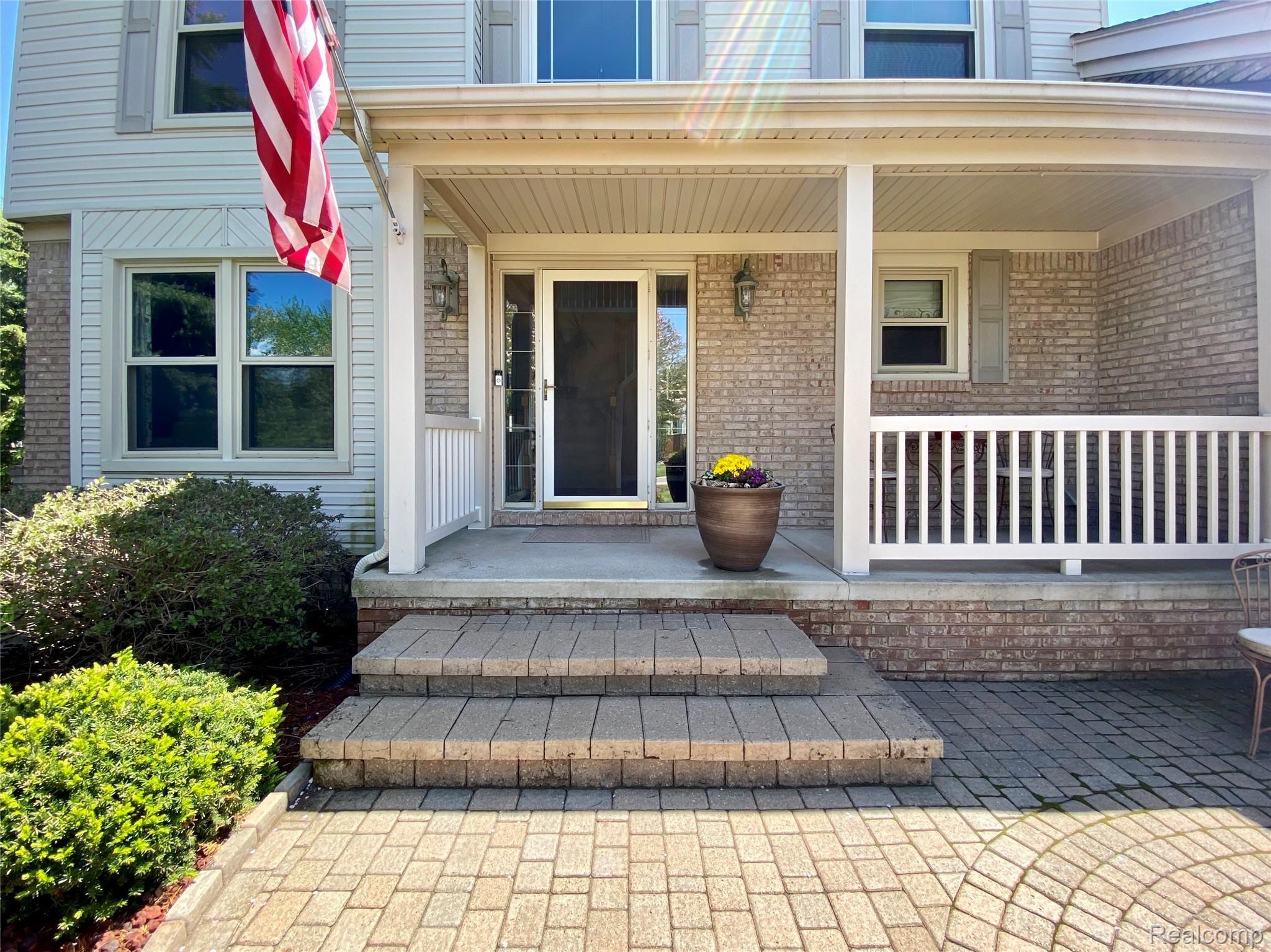 3939 May Center Road Lake Orion, MI 48360 - Photo 4 of 58 Large covered Front Porch for sitting with your morning coffee