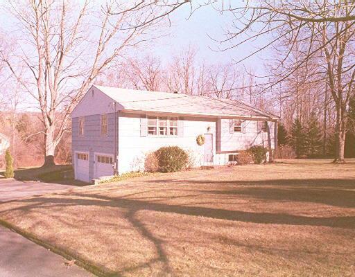 5 Vining Road Bethel, CT 06801 - Photo 1 of 1 a view of a house with a snow in the yard