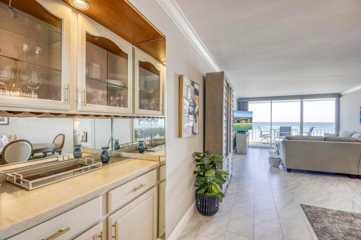 9600 South Ocean Drive, Unit 306 Jensen Beach, FL 34957 - Photo 13 of 36 a kitchen with a sink and a large window