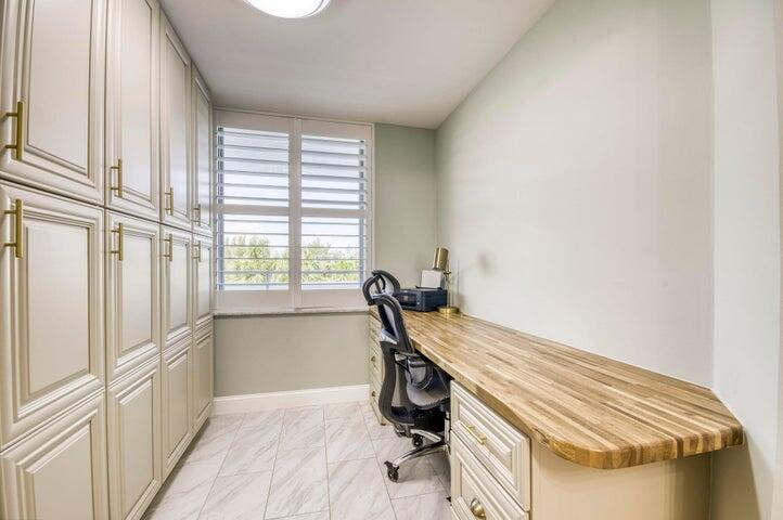 9600 South Ocean Drive, Unit 306 Jensen Beach, FL 34957 - Photo 18 of 36 a view of a workspace with furniture and a window