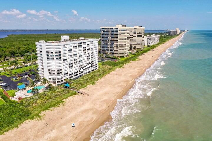 9600 South Ocean Drive, Unit 306 Jensen Beach, FL 34957 - Photo 2 of 36 a view of a city with tall buildings