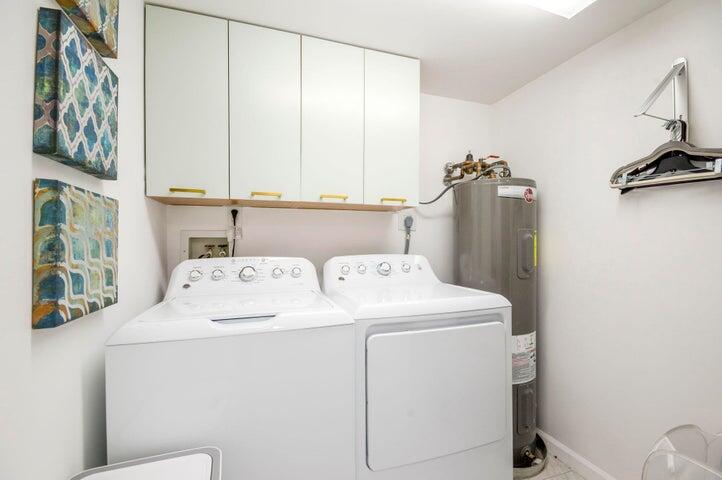9600 South Ocean Drive, Unit 306 Jensen Beach, FL 34957 - Photo 28 of 36 a utility room with dryer and washer