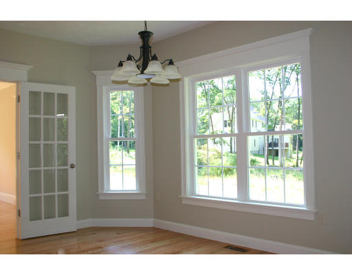 87 Lancaster County Road Harvard, MA 01451 - Photo 4 of 15 a view of an empty room with a window