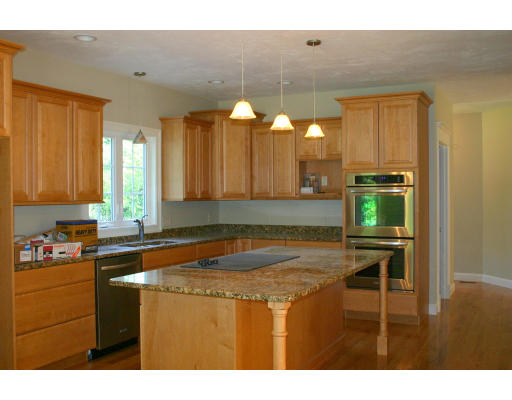 87 Lancaster County Road Harvard, MA 01451 - Photo 8 of 15 a kitchen with a sink cabinets and window