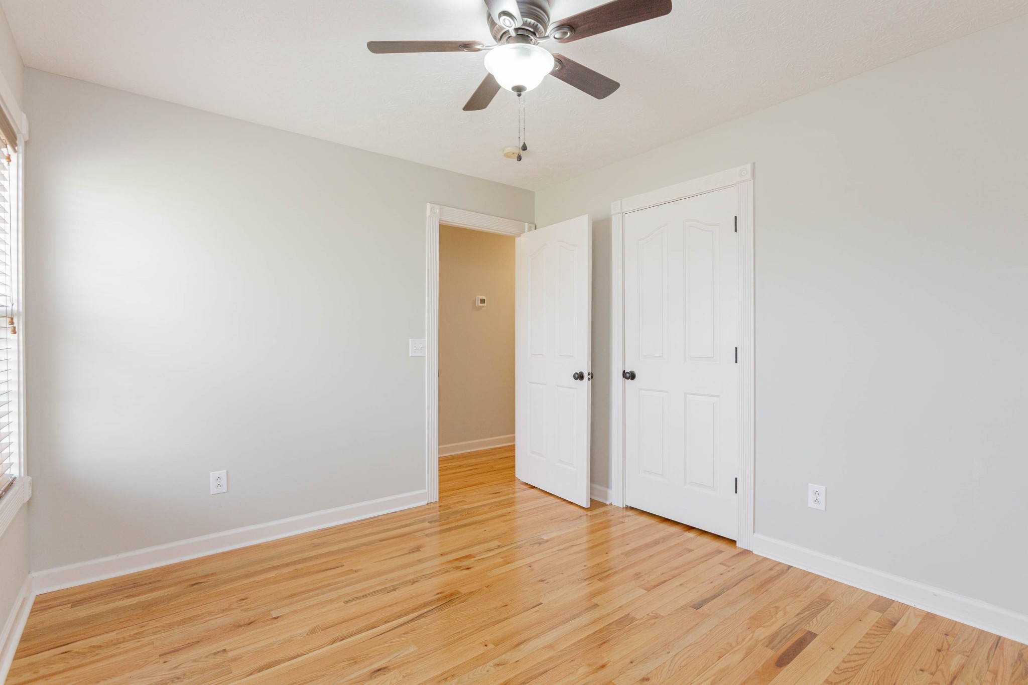122 Boiling Springs Road Portland, TN 37148 - Photo 14 of 27 wooden floor in an empty room