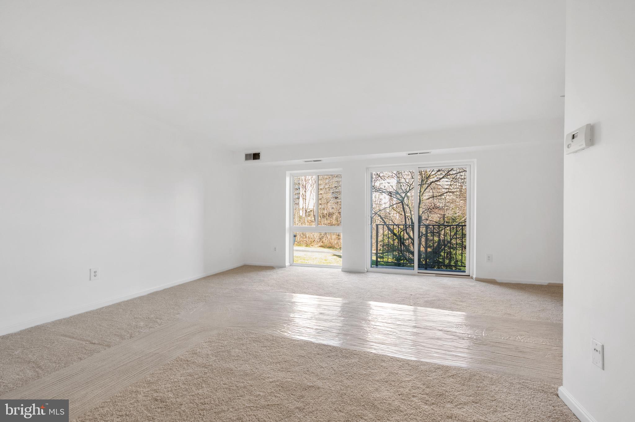 6137 Edsall Road, Unit F Alexandria, VA 22304 - Photo 2 of 36 an empty room with windows
