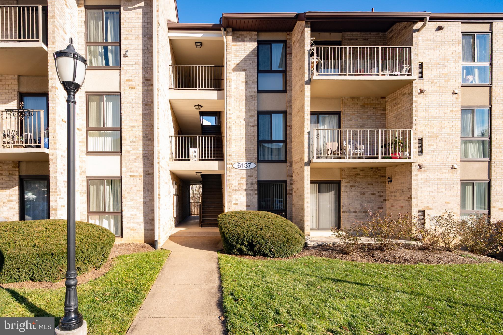 6137 Edsall Road, Unit F Alexandria, VA 22304 - Photo 24 of 36 a view of a building with a outdoor space