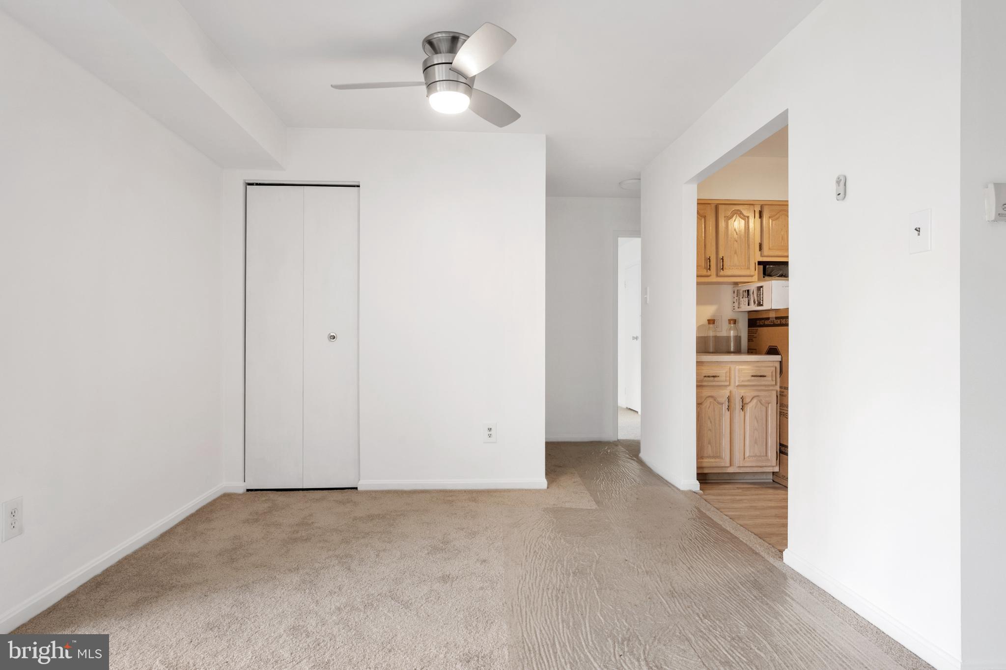 6137 Edsall Road, Unit F Alexandria, VA 22304 - Photo 5 of 36 wooden floor in an empty room