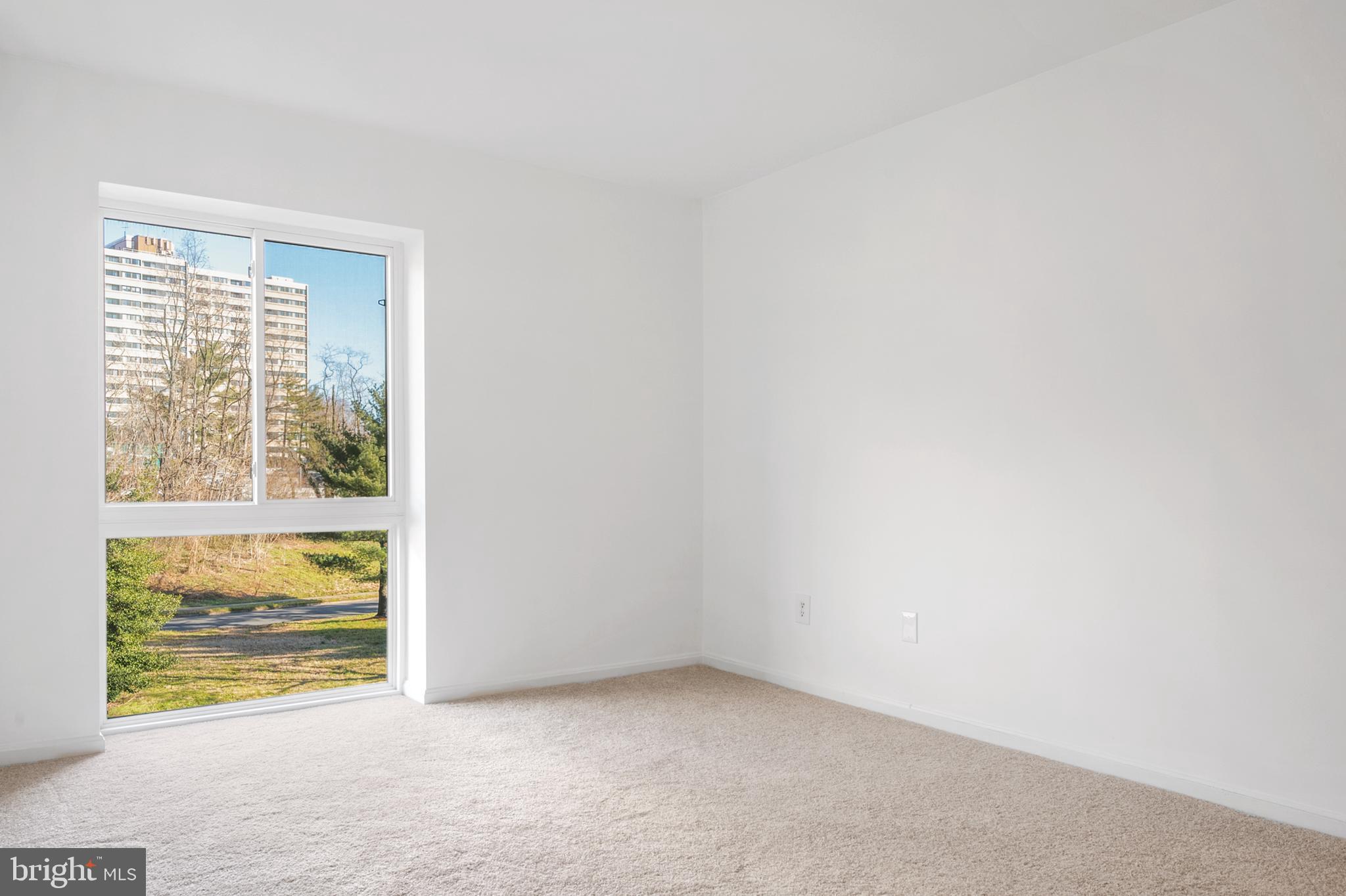 6137 Edsall Road, Unit F Alexandria, VA 22304 - Photo 6 of 36 an empty room with windows