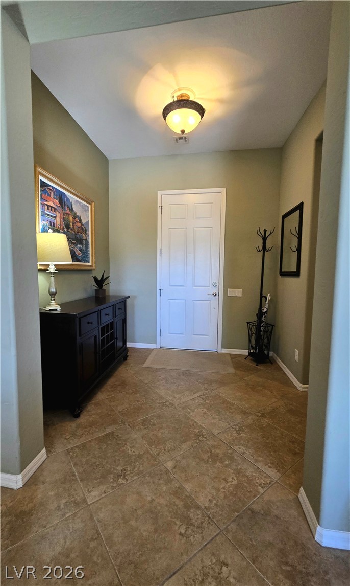 2567 Dirleton Place Henderson, NV 89044 - Photo 28 of 67 A welcoming entryway offers durable tile flooring and soft, ambient lighting.
