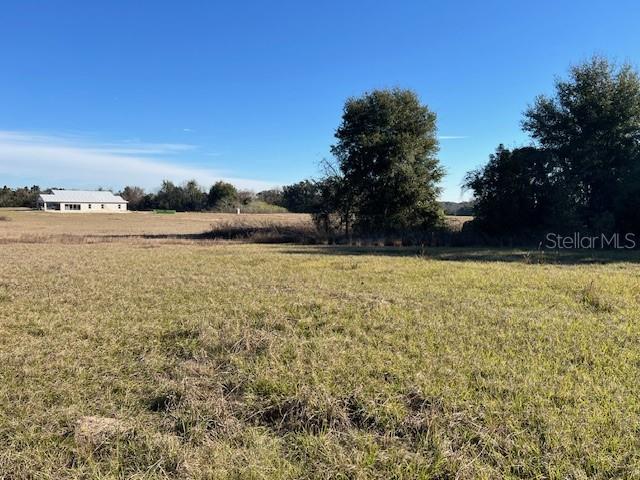 0 Northwest 95th Street, Unit LOT 8 Ocala, FL 34475 - Photo 1 of 4 a view of a lake view