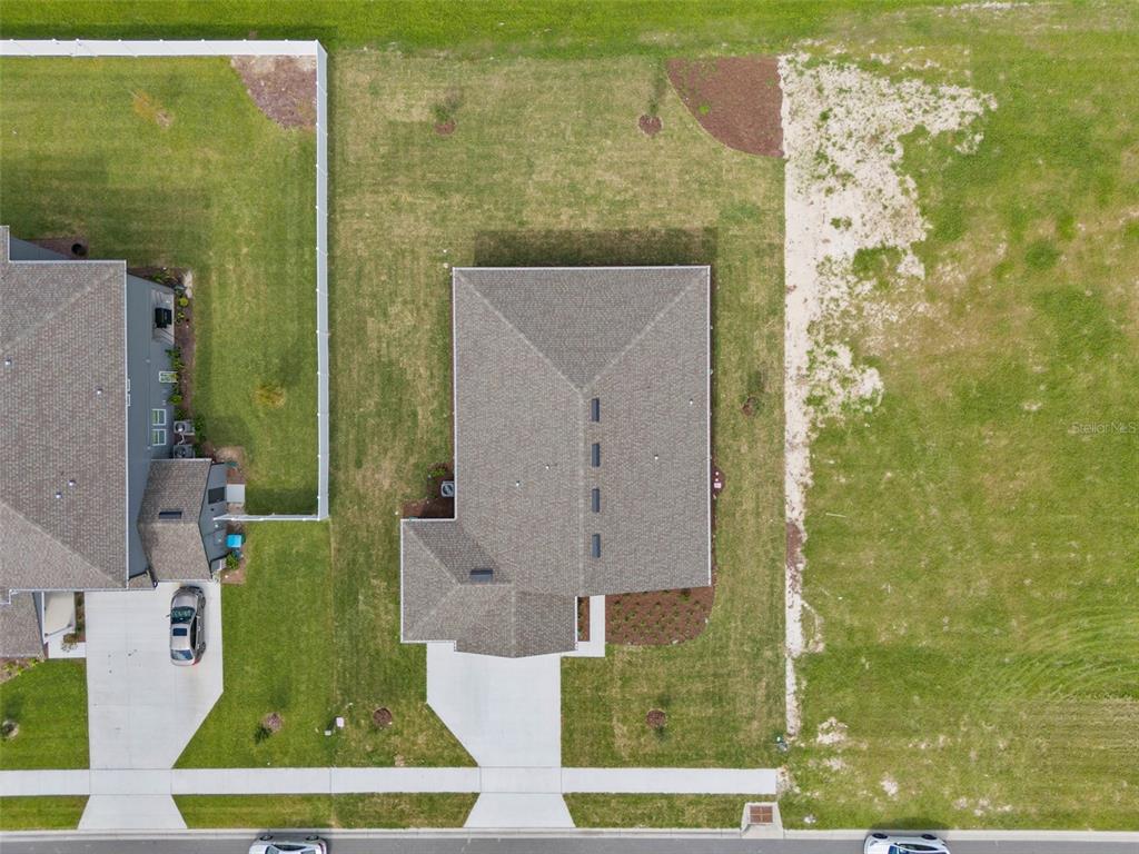 1122 Pearl Tree Road Deltona, FL 32725 - Photo 28 of 30 an aerial view of a house with outdoor space