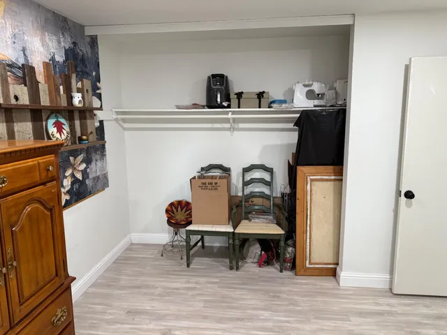 a view of a backyard with sitting area