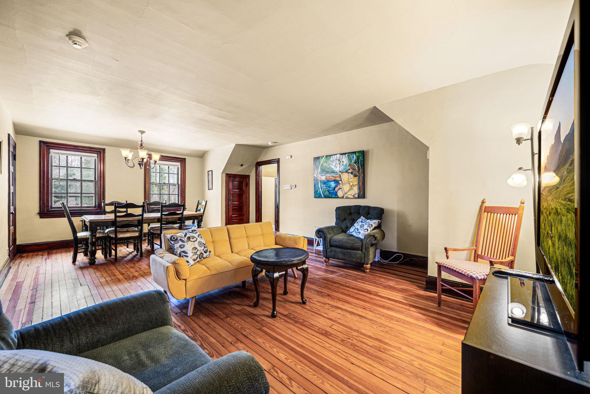 1018 Beech Road Wallingford, PA 19086 - Photo 56 of 66 a living room with furniture and wooden floor