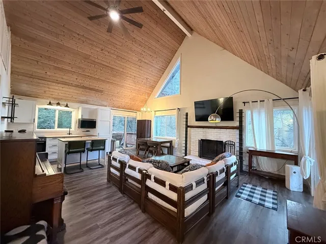 a very nice looking living room with a large window