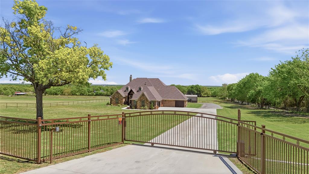 10106 Prather Road Springtown, TX 76082 - Photo 2 of 40 a view of a terrace with yard