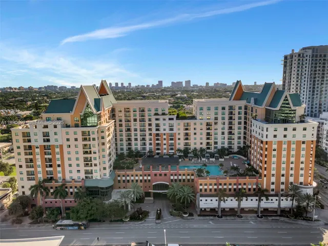 a view of a city with tall buildings
