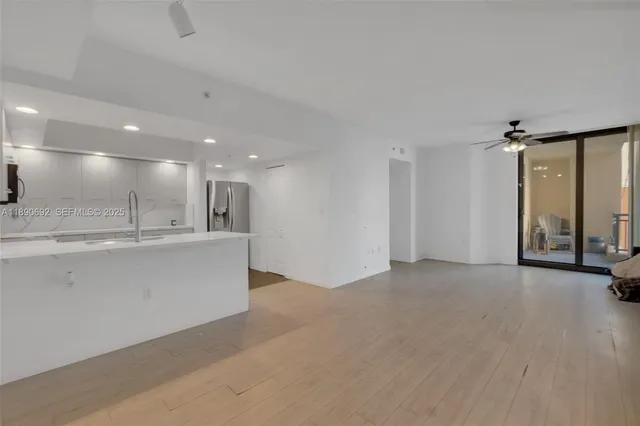 a view of an empty room and window