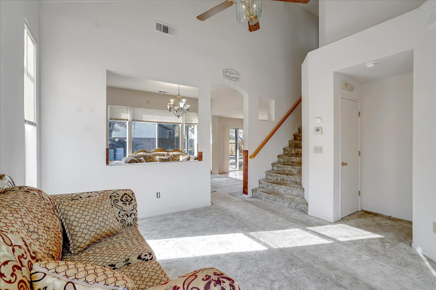 2113 Manhattan Way Modesto, CA 95358 - Photo 5 of 17 a living room with furniture and wooden floor