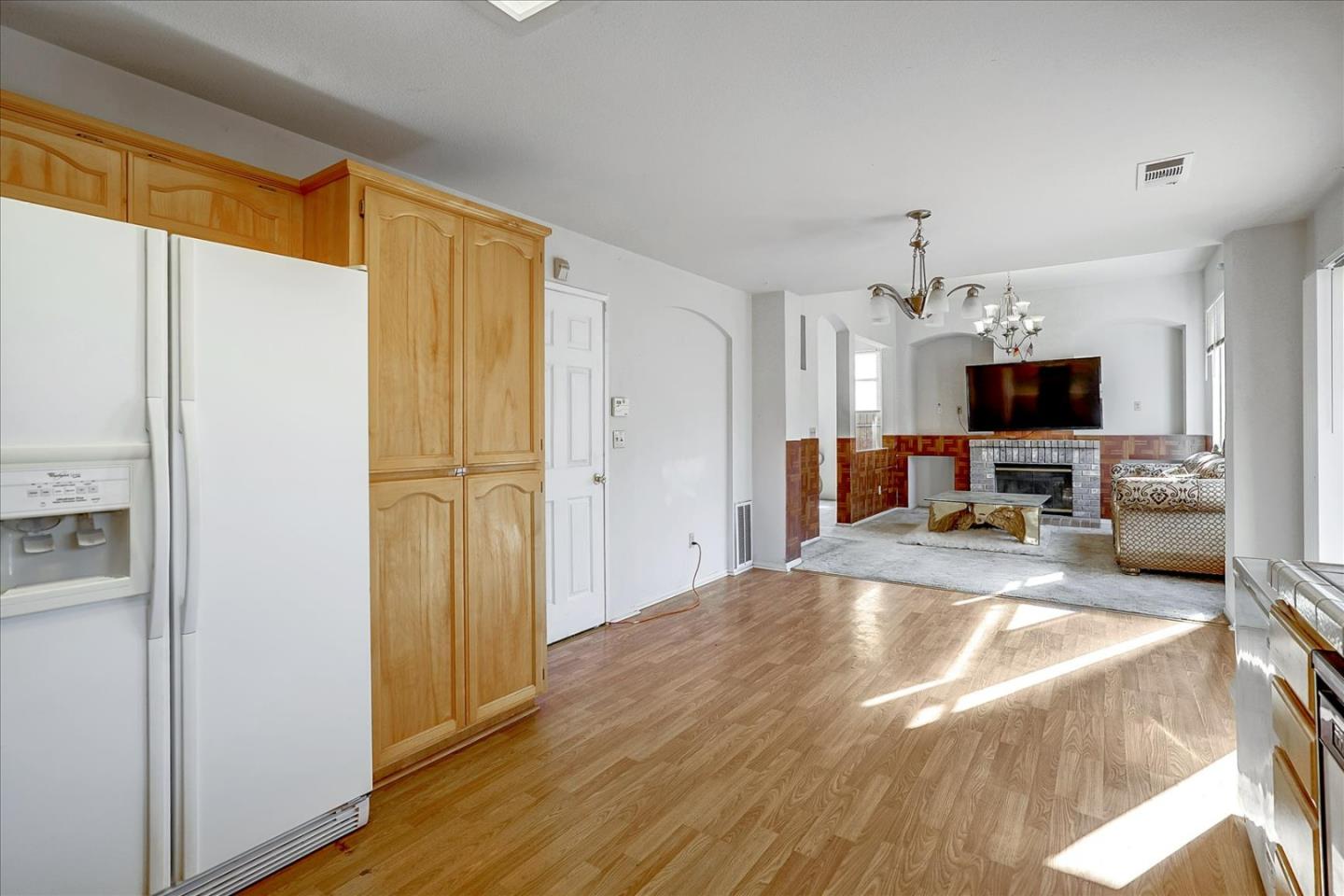 2113 Manhattan Way Modesto, CA 95358 - Photo 9 of 17 a view of a kitchen from a windows