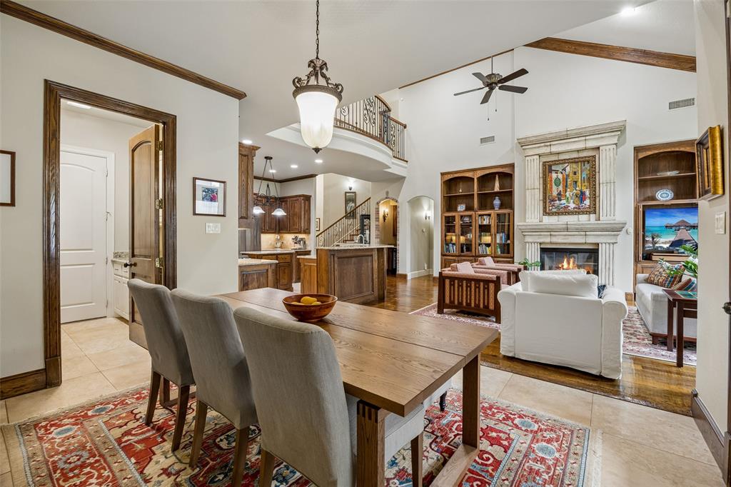 1608 Tuscan Ridge Circle Southlake, TX 76092 - Photo 15 of 36 a living room with fireplace furniture and a wooden floor
