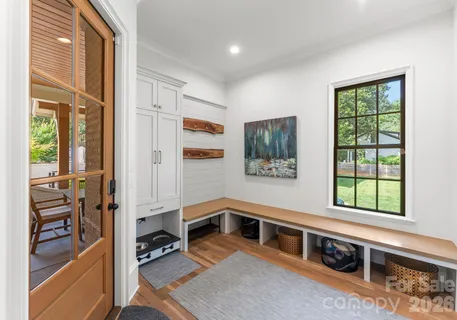 a view of a living room and entry way