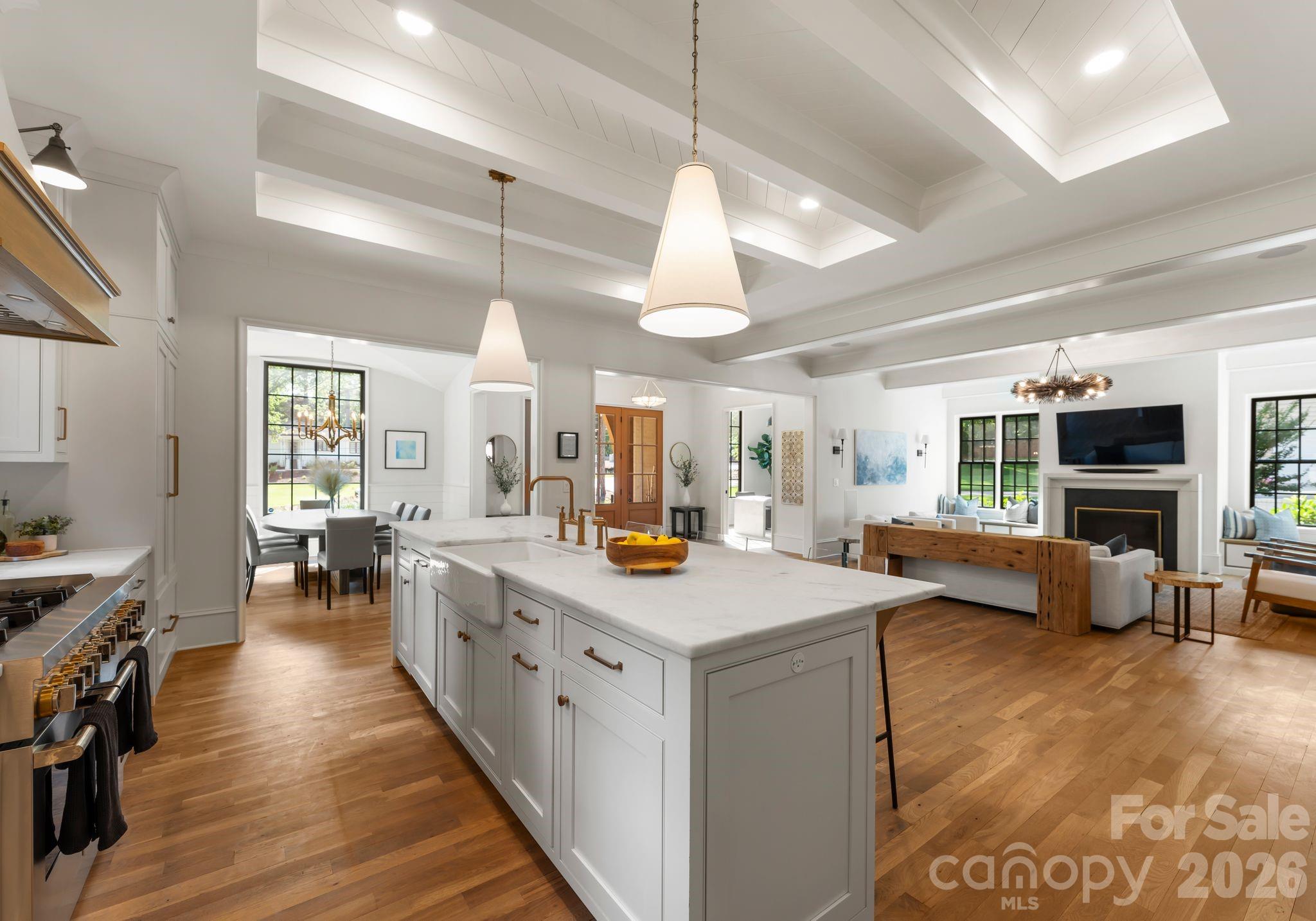 5625 Timber Lane Charlotte, NC 28270 - Photo 20 of 48 a view of a kitchen counter top space with furniture and wooden floor
