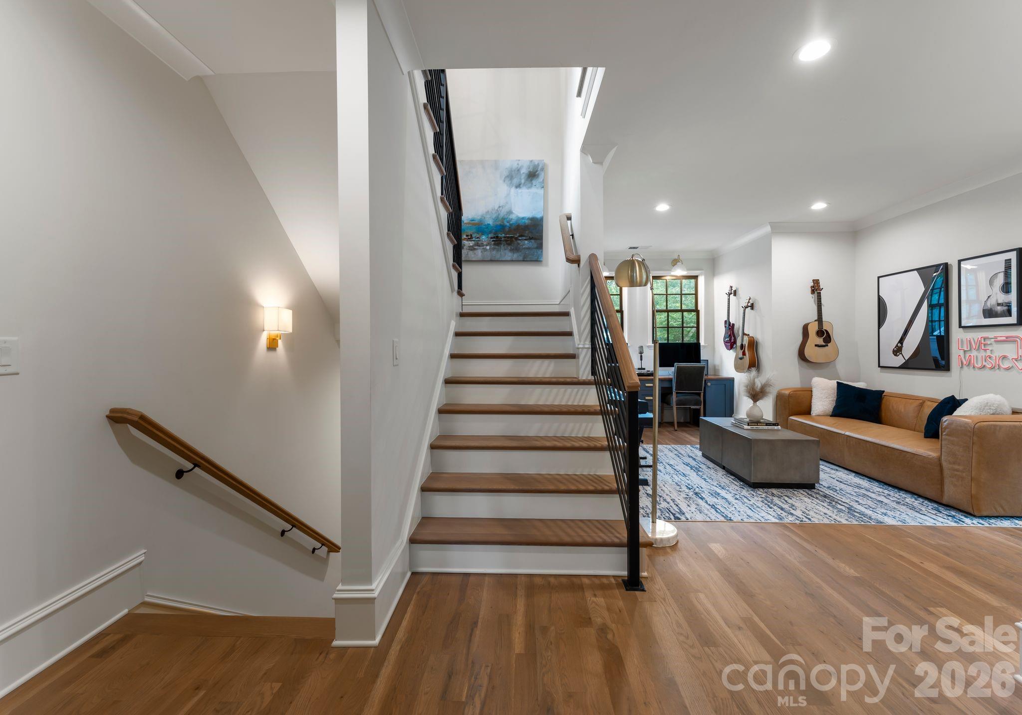5625 Timber Lane Charlotte, NC 28270 - Photo 25 of 48 a living room with furniture and stairs