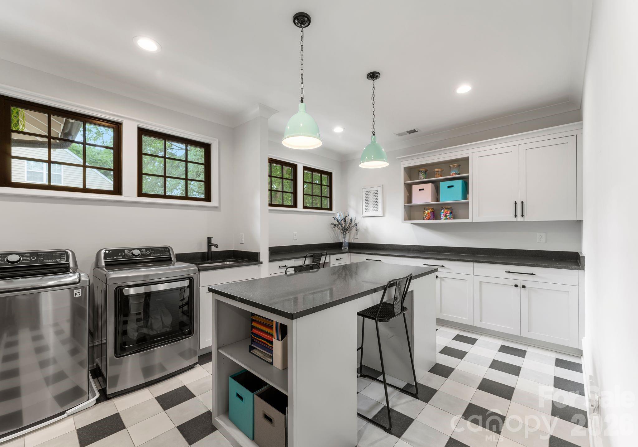 5625 Timber Lane Charlotte, NC 28270 - Photo 27 of 48 a kitchen with stainless steel appliances granite countertop a stove a sink and a refrigerator