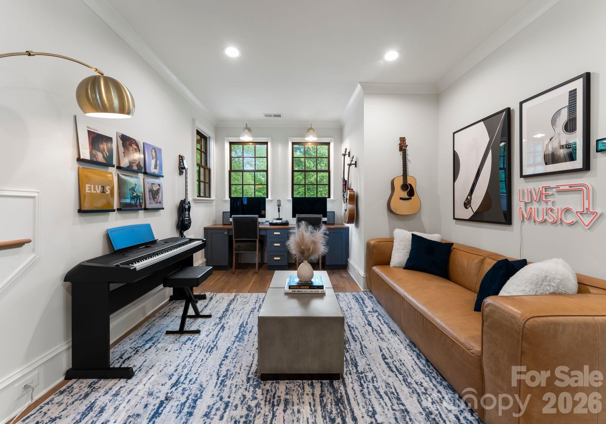 5625 Timber Lane Charlotte, NC 28270 - Photo 28 of 48 a living room with furniture fireplace and a wooden floor