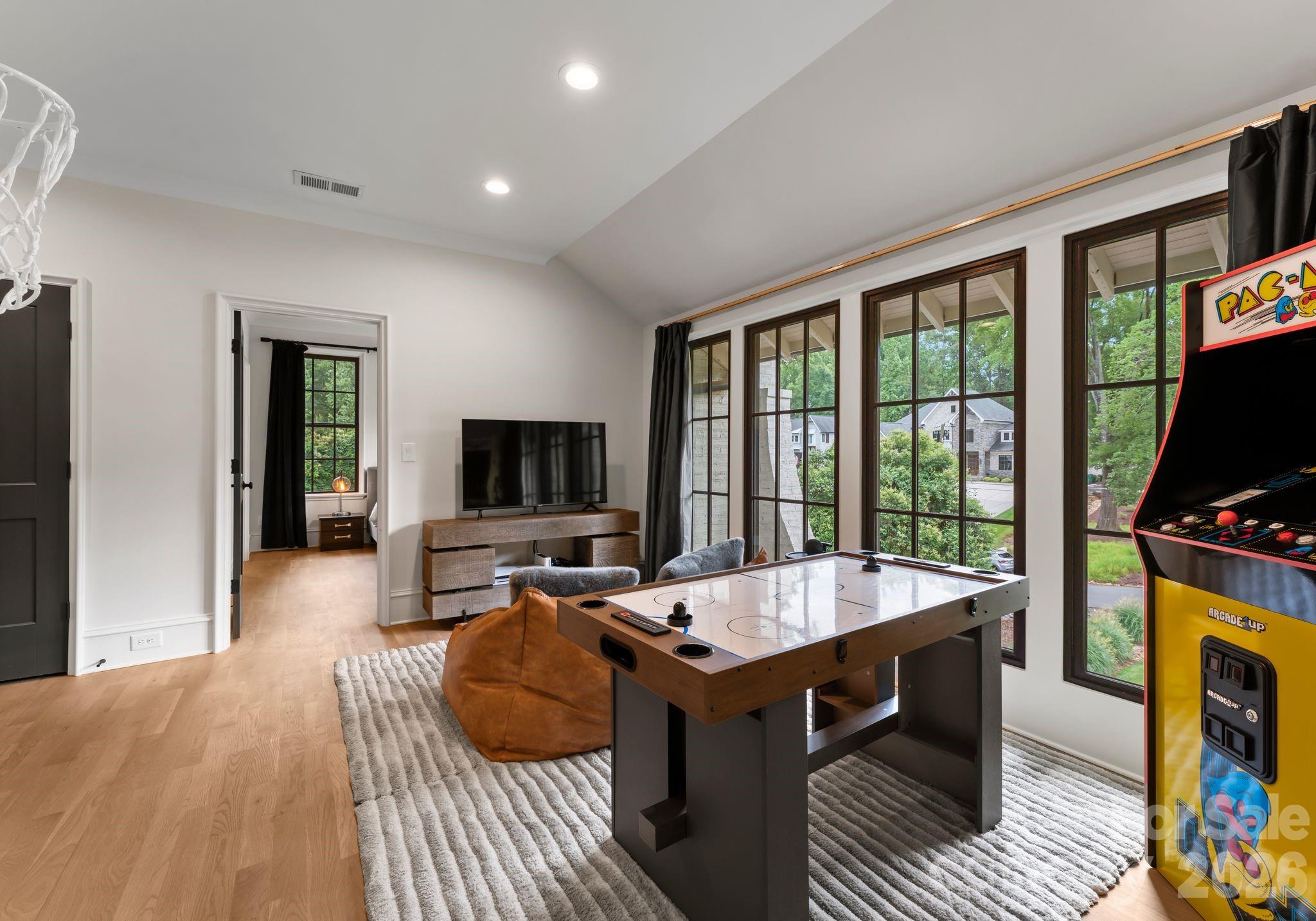 5625 Timber Lane Charlotte, NC 28270 - Photo 30 of 48 a living room with furniture and a flat screen tv