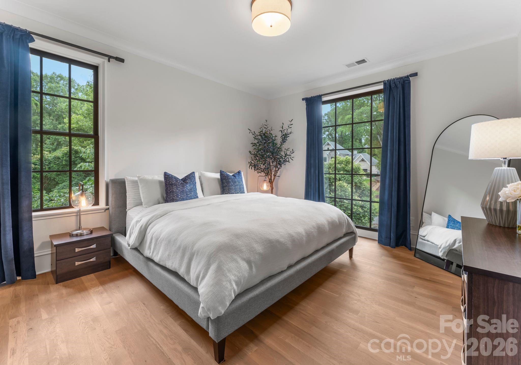 5625 Timber Lane Charlotte, NC 28270 - Photo 31 of 48 a bedroom with a large bed and a window