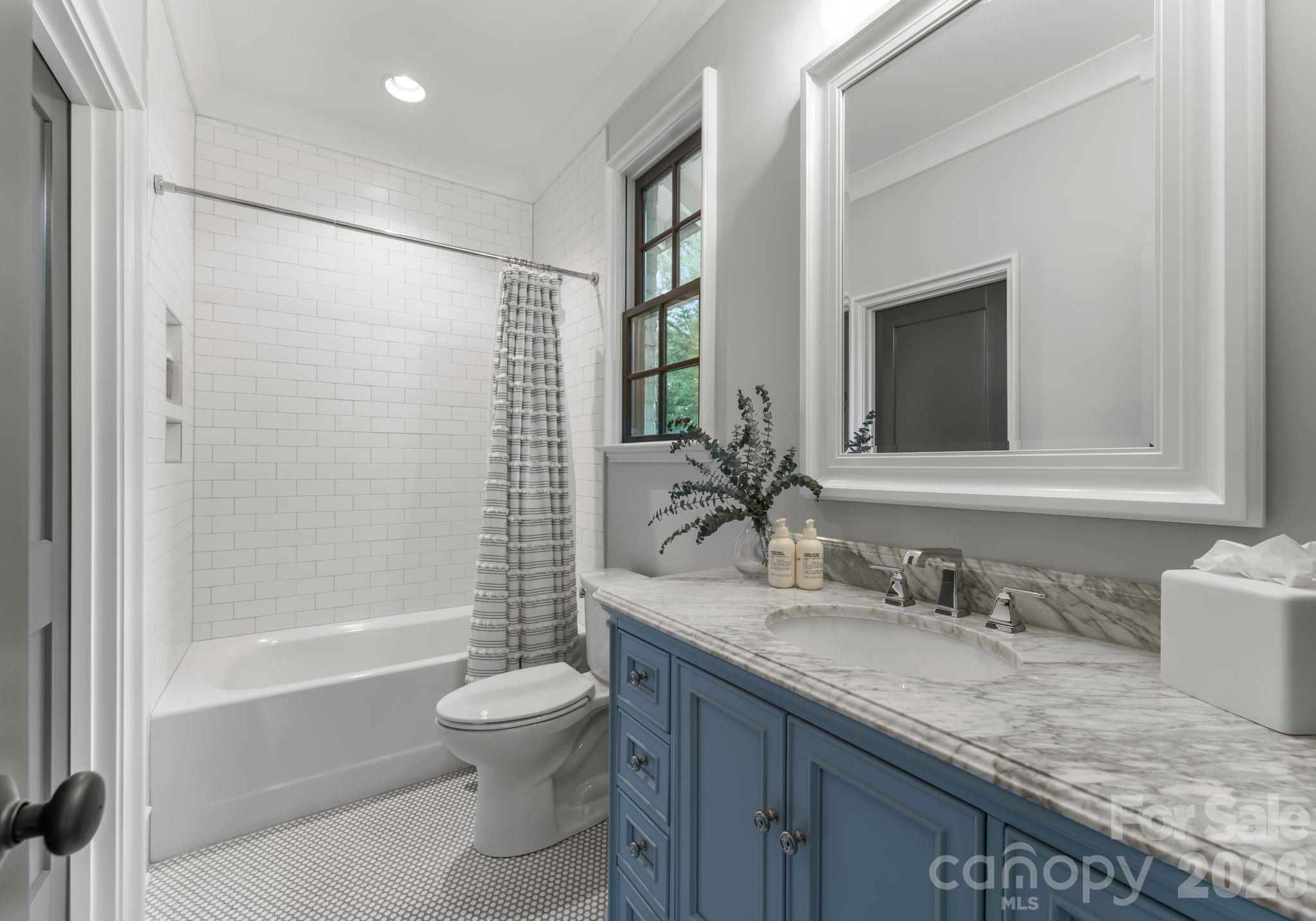 5625 Timber Lane Charlotte, NC 28270 - Photo 32 of 48 a bathroom with a granite countertop sink toilet and shower