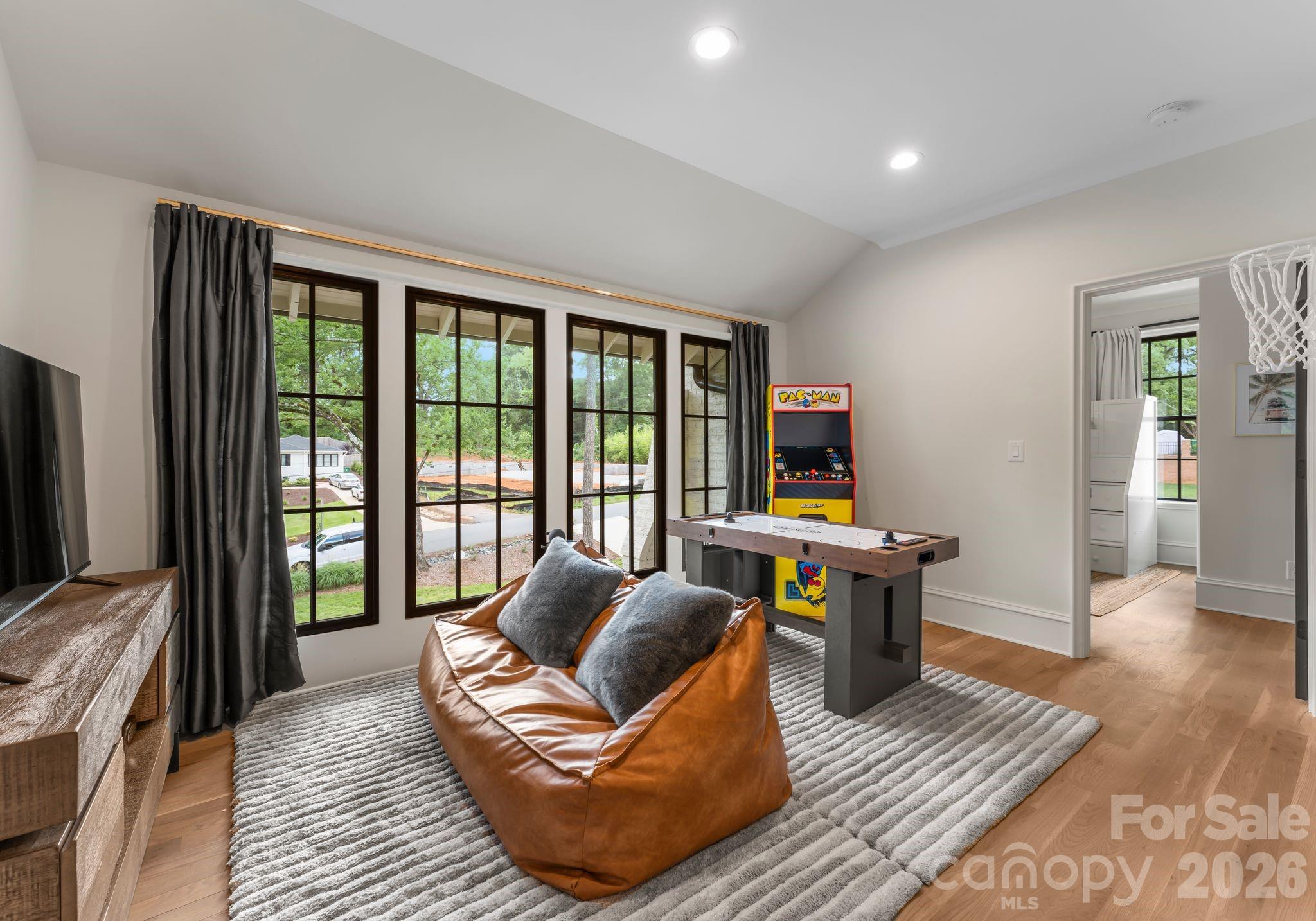 5625 Timber Lane Charlotte, NC 28270 - Photo 33 of 48 a living room with furniture and a flat screen tv