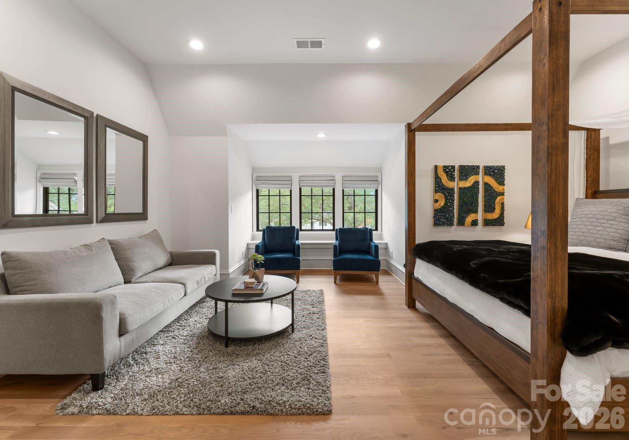 5625 Timber Lane Charlotte, NC 28270 - Photo 40 of 48 a living room with furniture and a large window