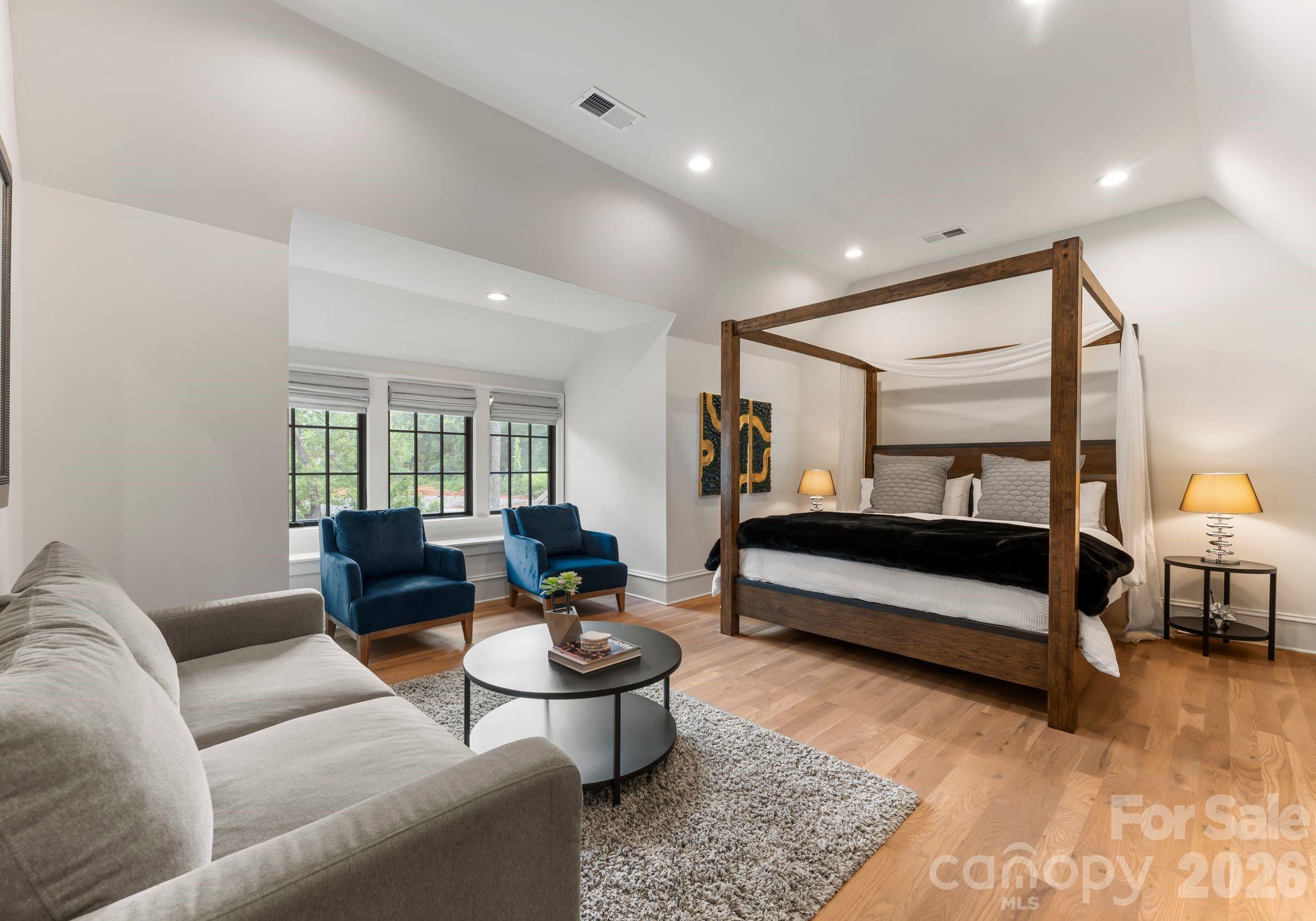 5625 Timber Lane Charlotte, NC 28270 - Photo 42 of 48 a bedroom with furniture and wooden floor