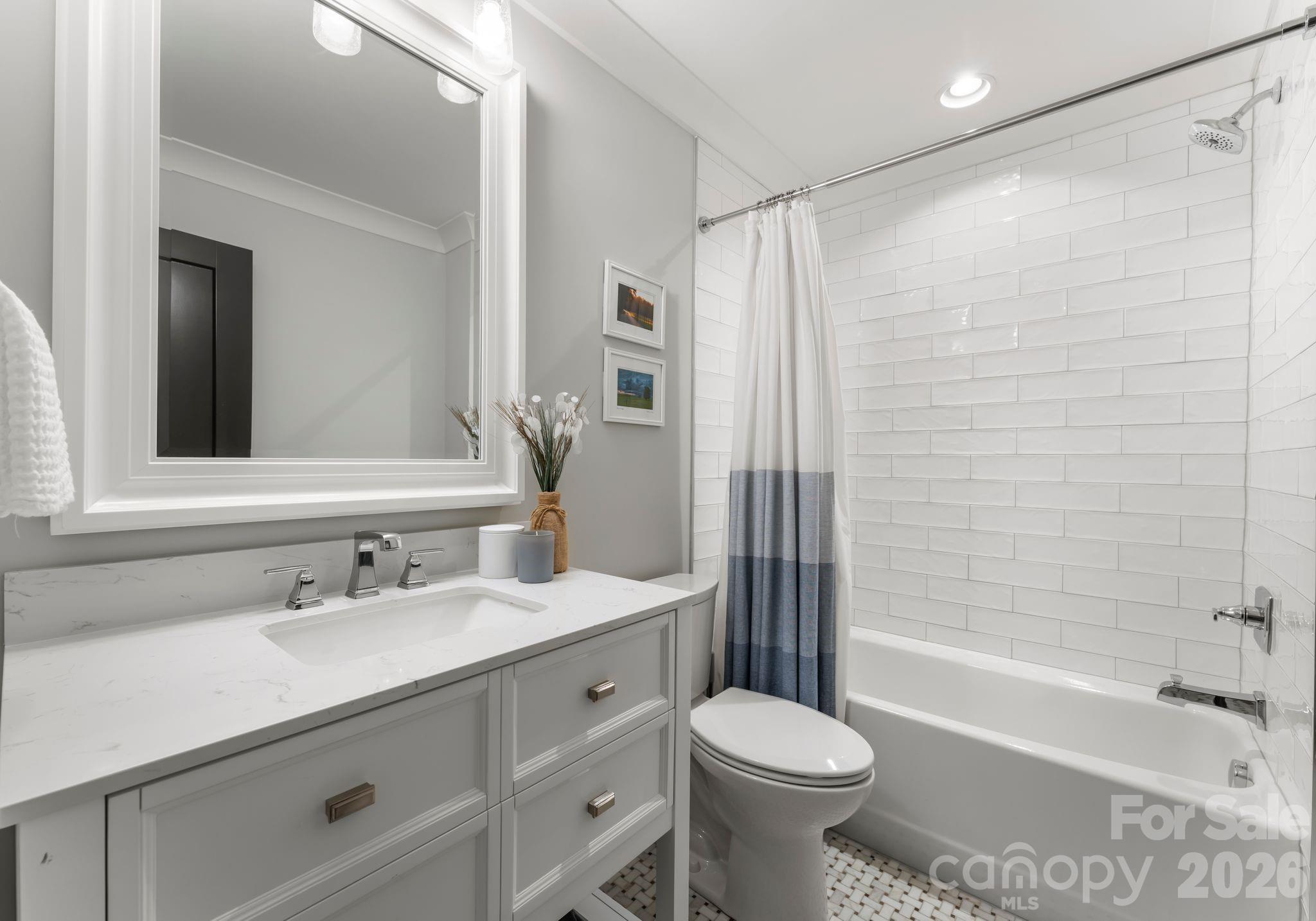 5625 Timber Lane Charlotte, NC 28270 - Photo 43 of 48 a bathroom with a sink toilet tub and shower